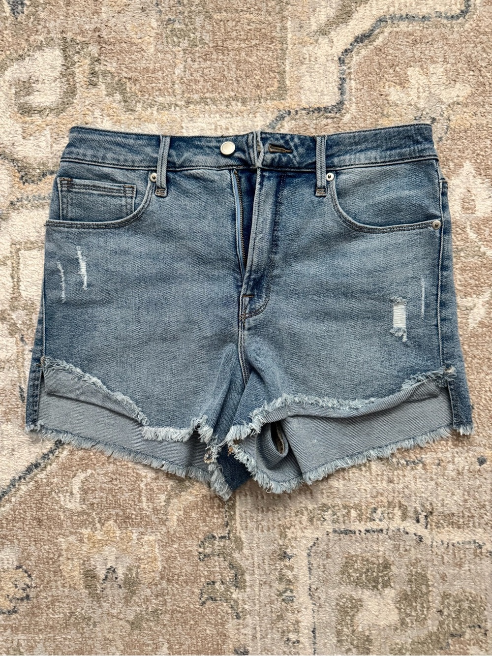 Good American Light Blue High-Rise Distressed Denim Shorts